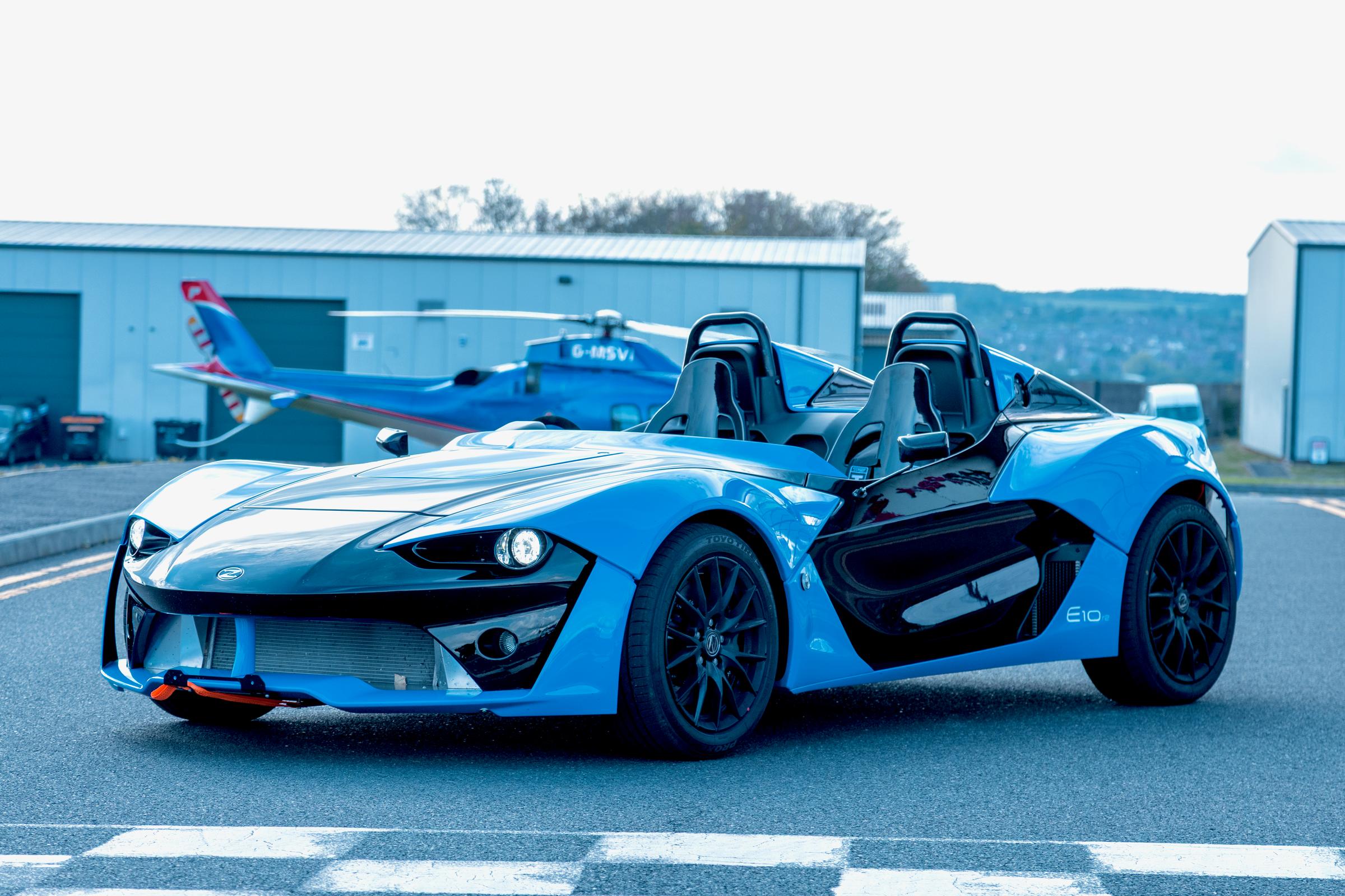 Zenos E10 on a checkered line, front three quarter view